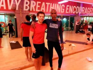 Crunch Fitness Yoga Teacher, Tony Eason & Yoga Teacher, Alex Lee.