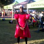 ALC cyclist wearing a red dress