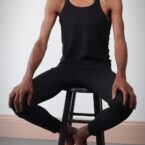 Yoga Teacher, Tony Eason sitting in yoga studio